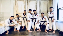 功夫时代承示范团副队长王拓受邀参加母校跆拳道交流会